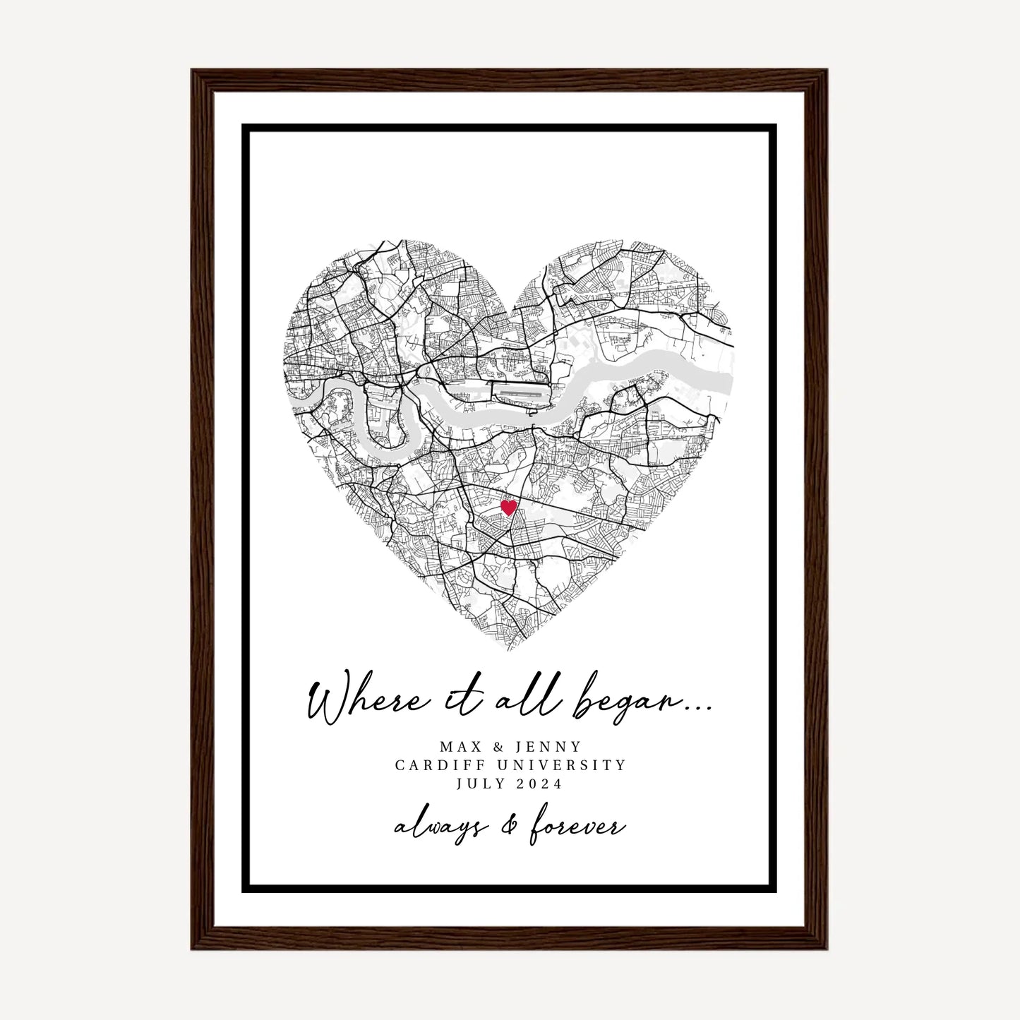 Personalised 'Where It All Began' framed print featuring a heart-shaped city map marking the couple's special meeting location. Customisable with names, location and the date. Presented in a dark brown wooden frame.