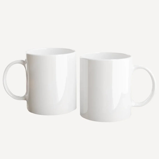 White mug with xxxx; handle and interior is coloured xxx.