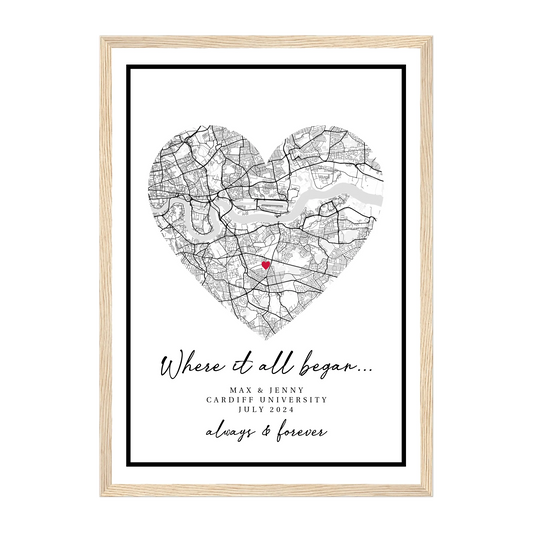 Personalised 'Where It All Began' framed print featuring a heart-shaped city map marking the couple's special meeting location. Customisable with names, location and the date. Presented in a natural wooden frame.
