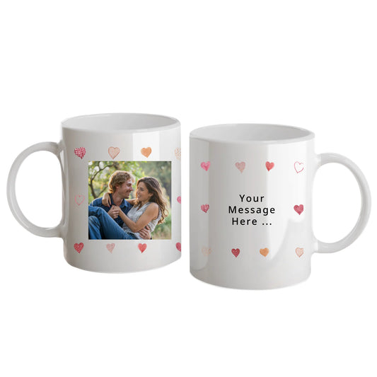 White mug with xxxx; handle and interior is coloured xxx.
