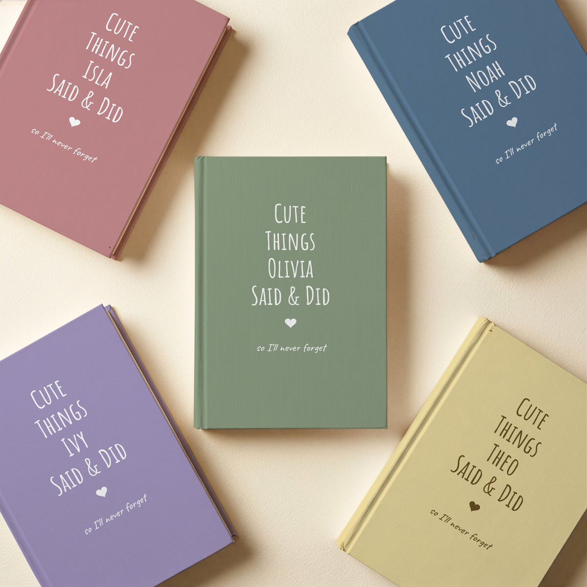 Five Cute Things Said & Did journals in sage green, dusty blue, dusty rose, lavender and butter yellow with different names