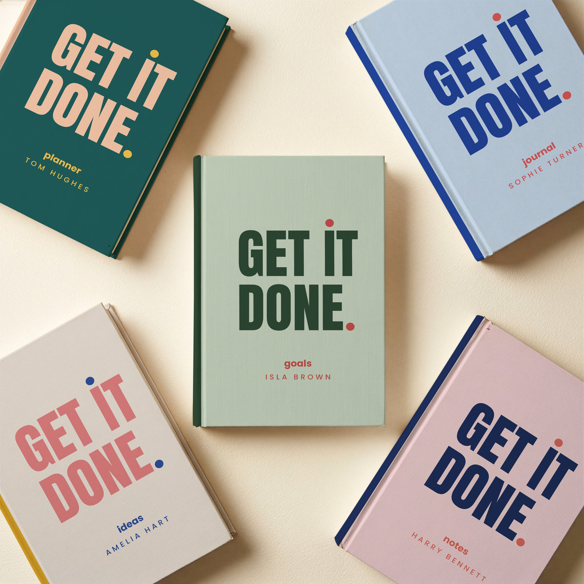 Five personalised 'GET IT DONE.' notebooks in different colourways with different names and cover words