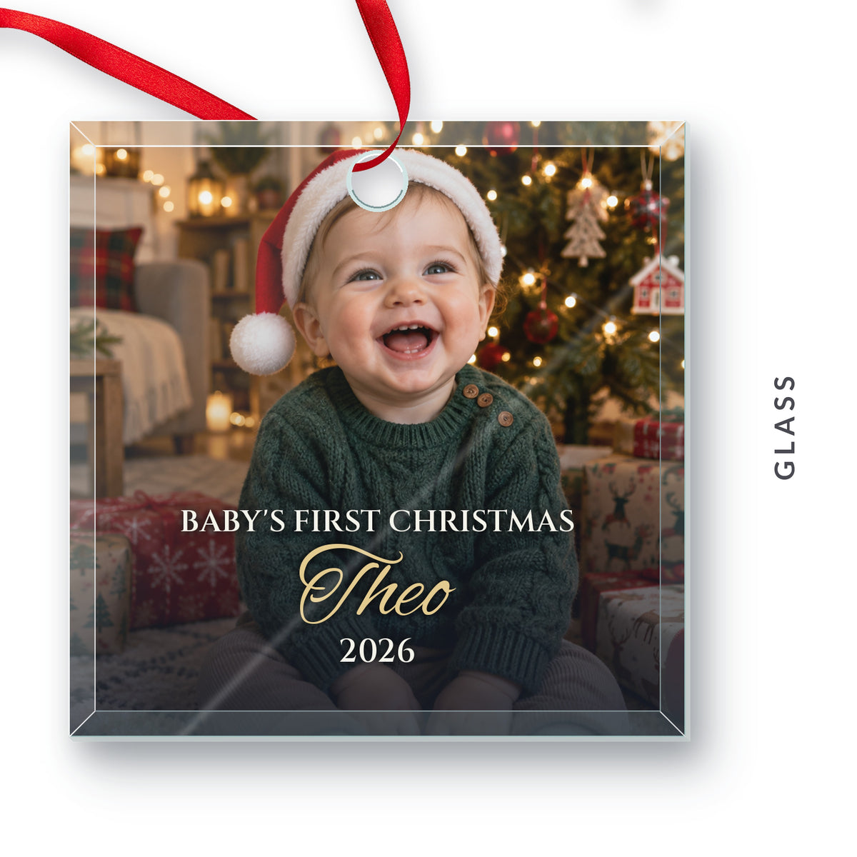 Glass Baby's First Christmas photo ornament for Theo, 2026, bevelled square with a red ribbon, labelled Glass